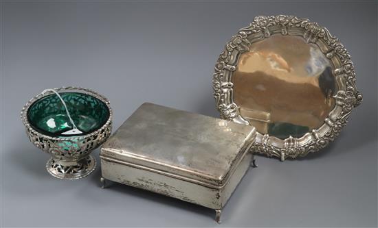 A George V Irish silver sugar basket, Dublin, 1918, a silver cigarette box and a silver salver.